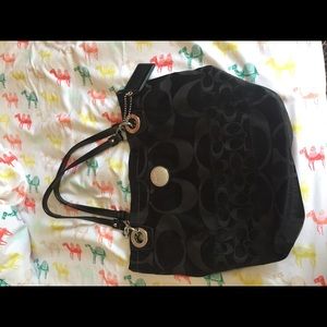 Black Coach pure with light blue interior.